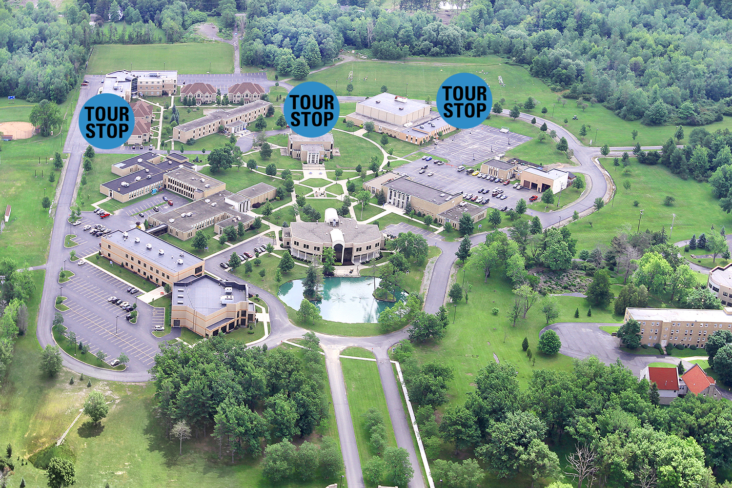 Aerial View of Hilbert College with Blue Tour Stop Symbols at The Campus Center, The Residence Halls, and Hafner Recreation Center