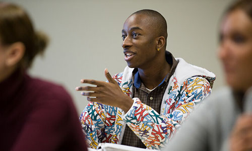 A student talks during a Hilbert College lesson.
