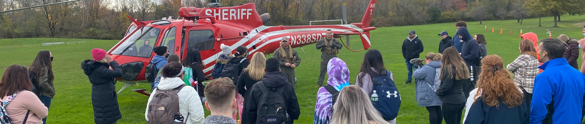 The Sheriff's helicopter landing on campus for a demonstration for Criminal Justice