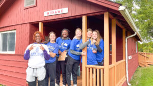 Day of Caring students posing for the camera at Cradle Beach