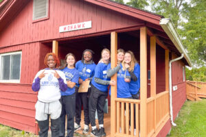 Day of Caring students posing for the camera at Cradle Beach