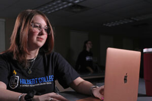 A student working on her computer.