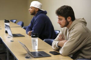 Students at Hilbert learning in a classroom.