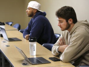 Students at Hilbert learning in a classroom.