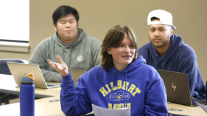 Hilbert students communicating and listening in class.