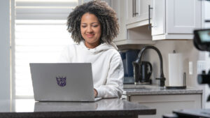 A graduate student learning online.